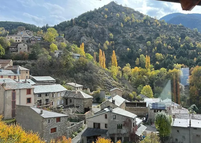 Cal Gano, 3-Story Stone & Wood Mountain Retreat